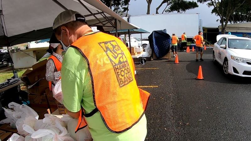 Volunteers handed out the food Wednesday at a pop-up distribution event.