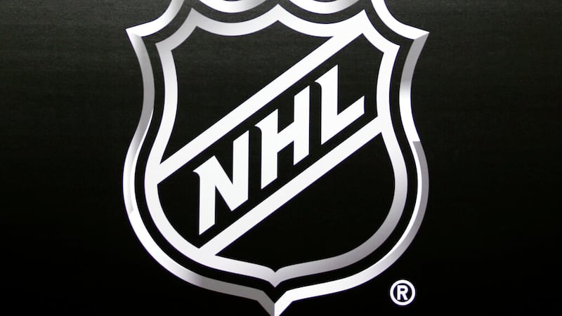 In this June 22, 2016, file photo, the NHL logo is shown during a press conference in Las...