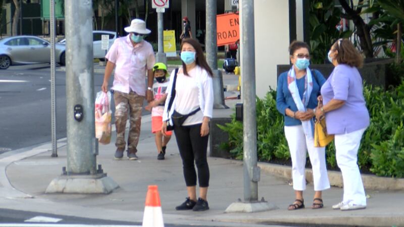 Green suggest people wear mask when social distancing is not possible.