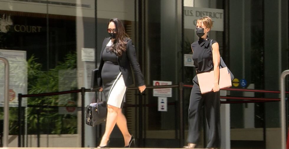 Attorney Sheri Tanaka with client and grand jury witness Michelle McDonald