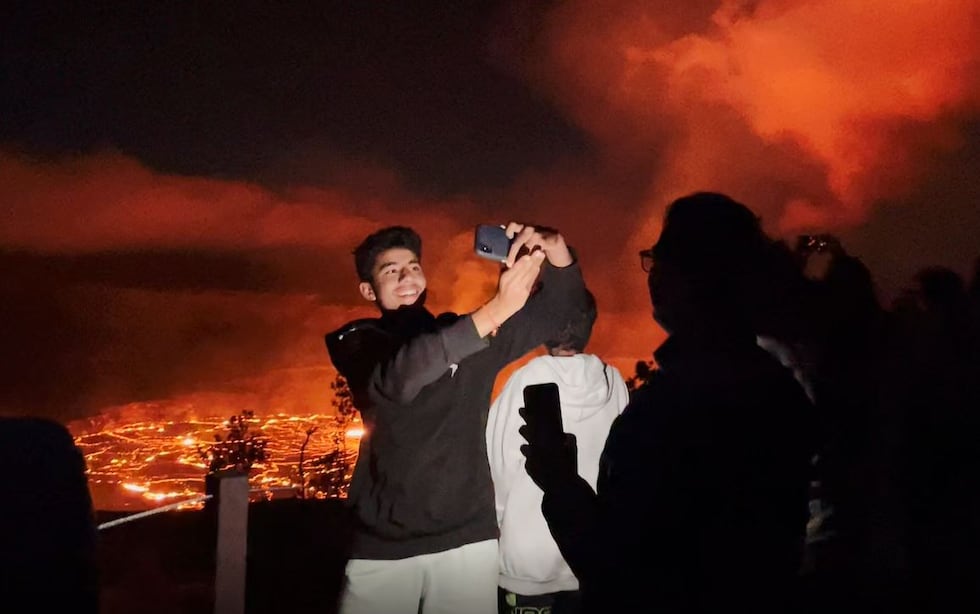Visitors hope to snap the perfect picture with the Kilauea eruption.