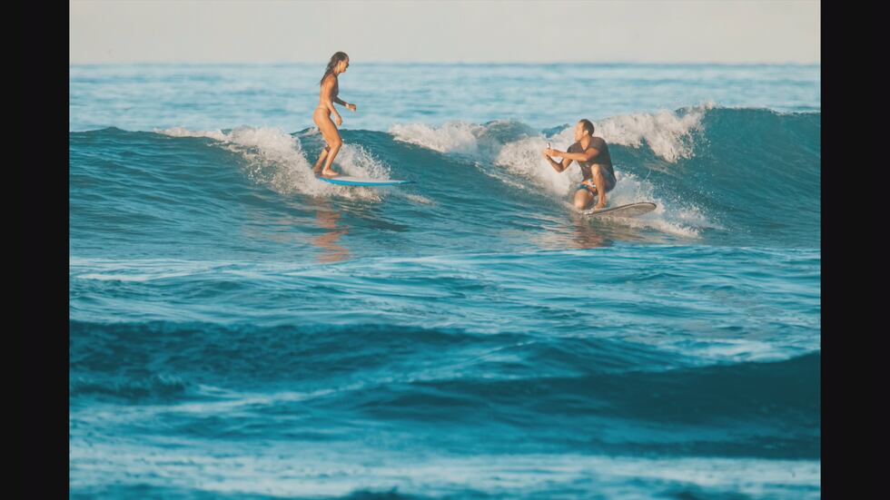 Chris Garth and Lauren Oiye got engaged this past weekend in the waters off Waikiki.