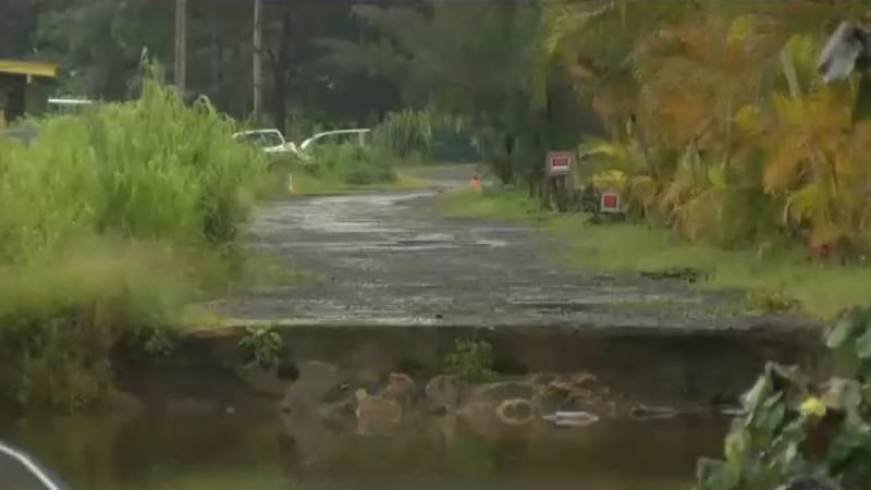 This is what Weke Road in Hanalei looked like following the storm. It was impassable to...
