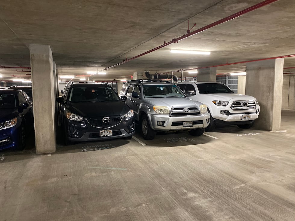 A photo by a resident shows narrow parking stalls in the lot for Ke Kilohana.
