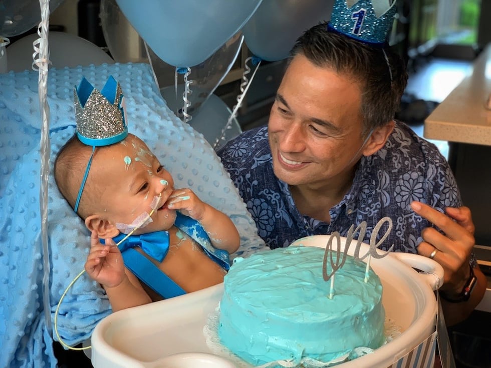 Ching and his son, Eli, celebrate the baby's first birthday earlier this year.