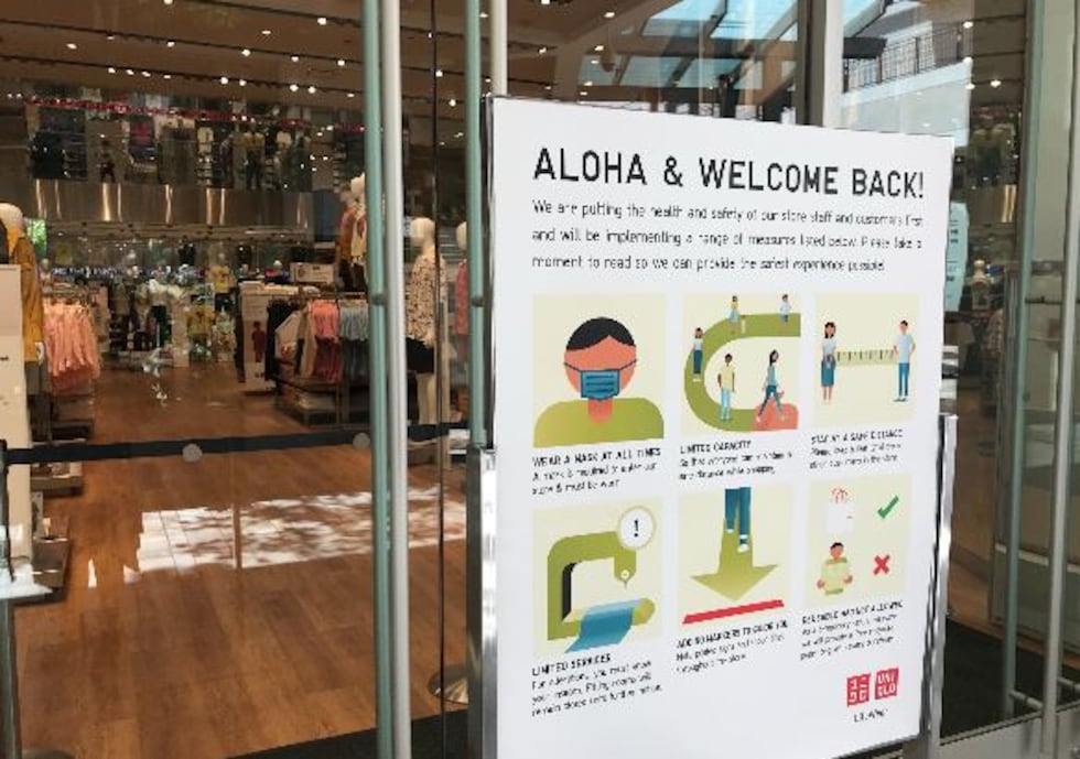 Signage is posted all over Ala Moana Center reminding customers to wear mask and practice good...