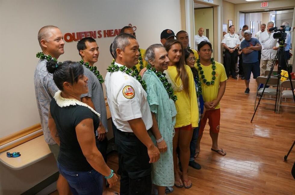 Larry Gambone smiles along with the group that saved his life. (Samie Gebers)