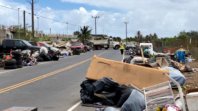 Maui County employees and contractors removed 13 remaining vehicles and eight more tons of...