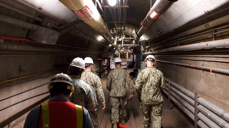 In this Dec. 23, 2021, photo provided by the U.S. Navy, Rear Adm. John Korka, Commander, Naval...