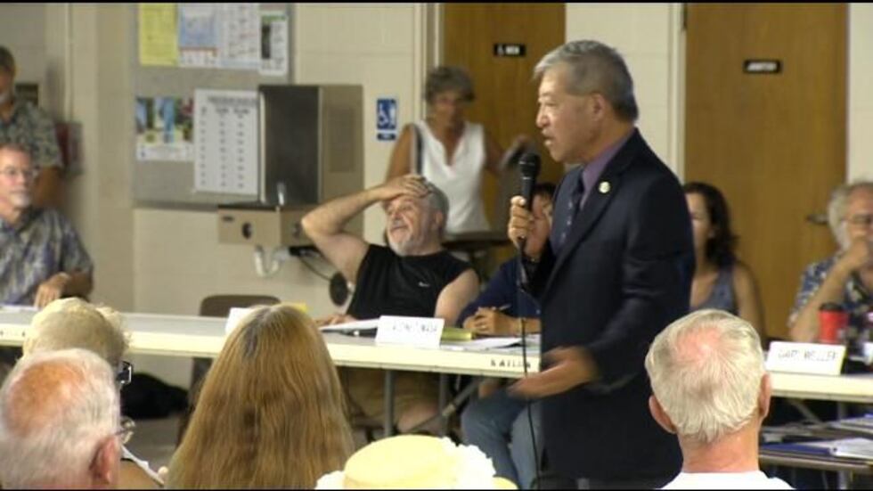 Prosecutor Keith Kaneshiro (standing with microphone)