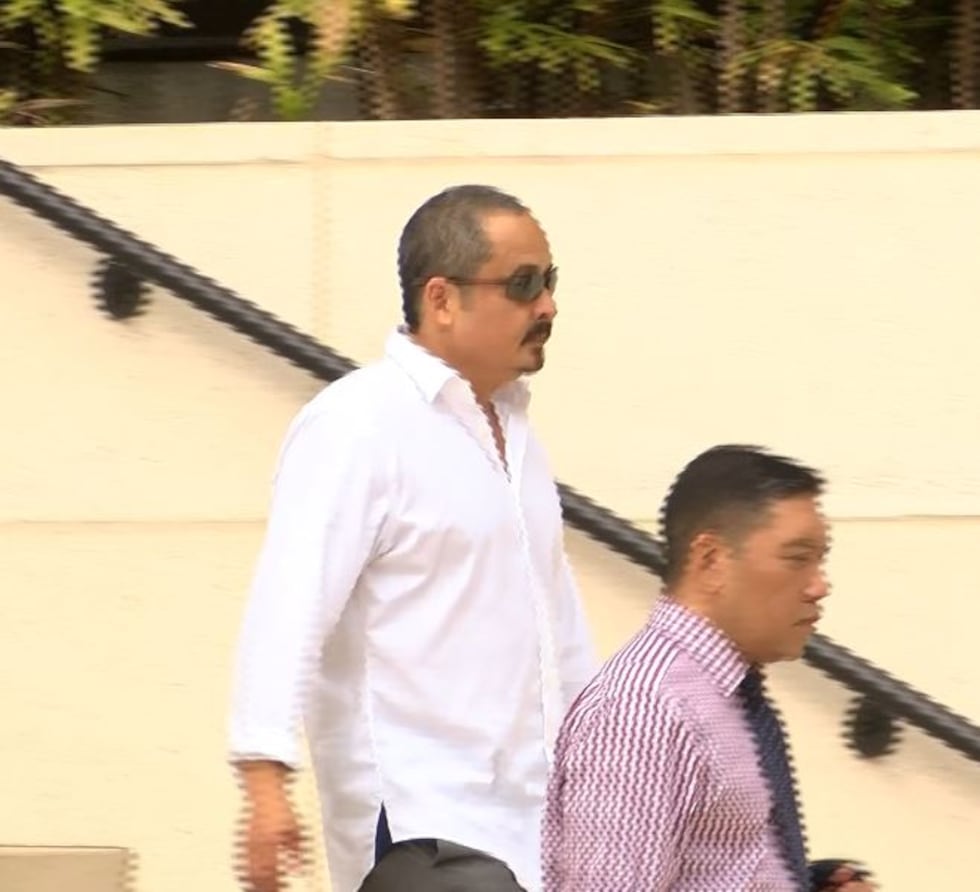 Chris McKinney leaves court after testifying before the federal grand jury