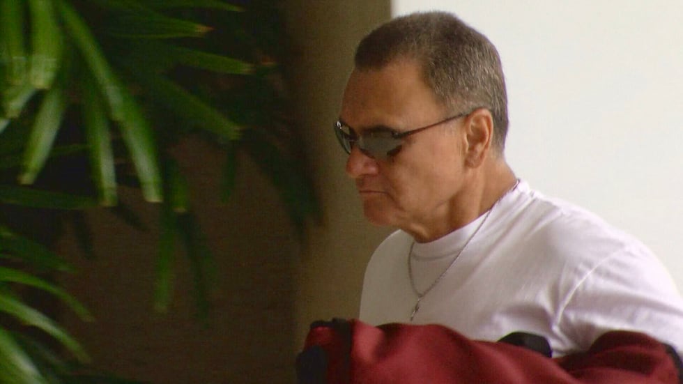 Gerard Puana enters the federal courthouse Wednesday as the so-called "mailbox trial"...