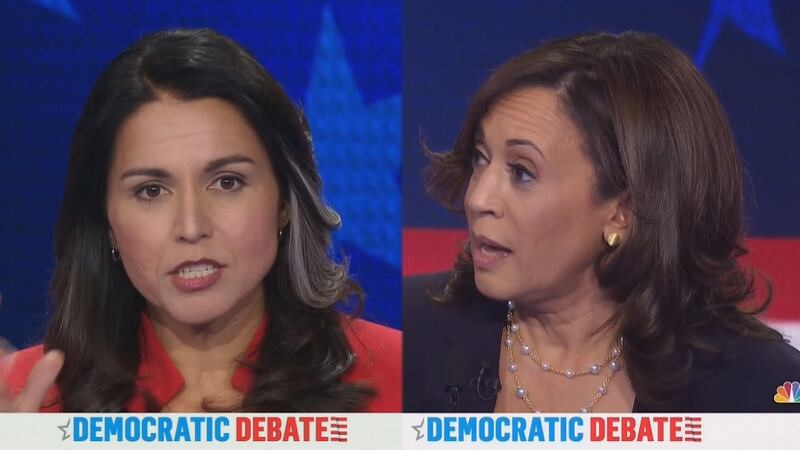 U.S. Rep. Tulsi Gabbard (left) says fellow presidential contender U.S. Sen. Kamala Harris...