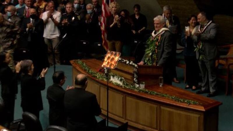 Chief Justice Mark Recktenwald is applauded by a House and Senate and Governor Josh Green...