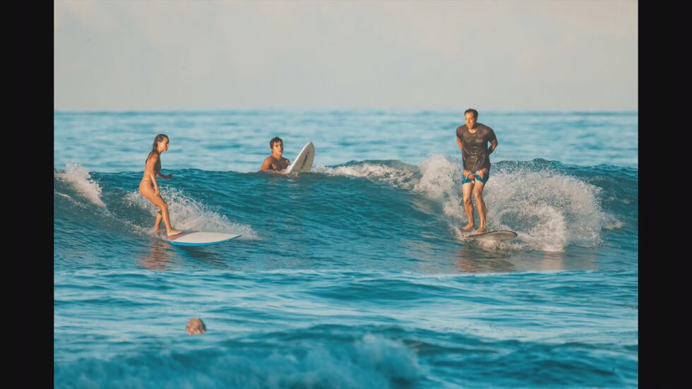 Chris Garth and Lauren Oiye got engaged this past weekend in the waters off Waikiki.