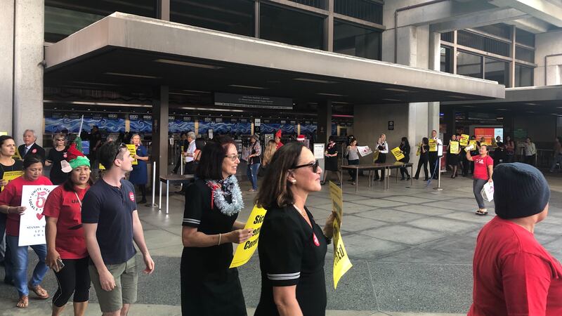 Flight attendants picketed at the Daniel K. Inouye International Airport. (Image: Hawaii News...