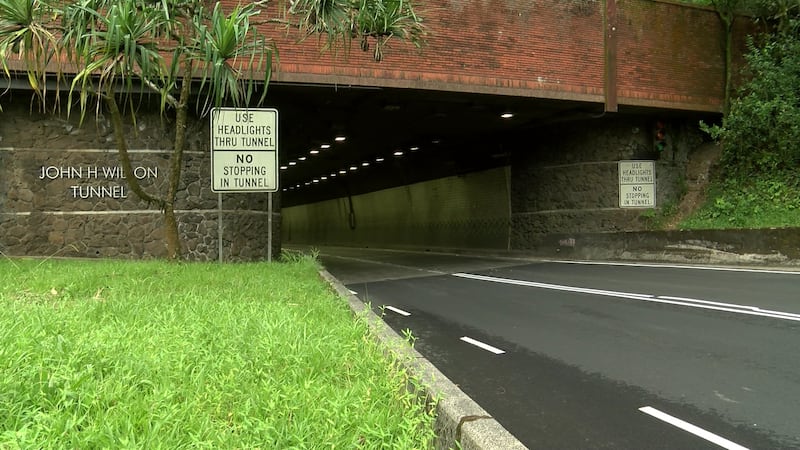 The Honolulu-bound lanes of the Likelike Highway at the Wilson Tunnel remain shut down Friday...